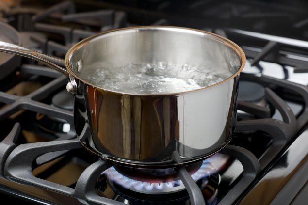 Pot of boiling water on a stove